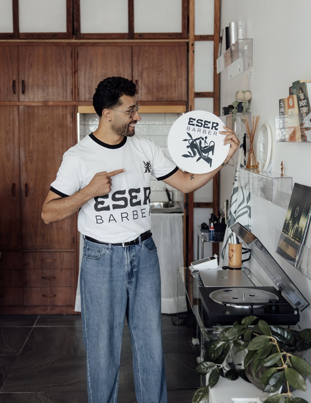 Person holding Eser Brand merchandise