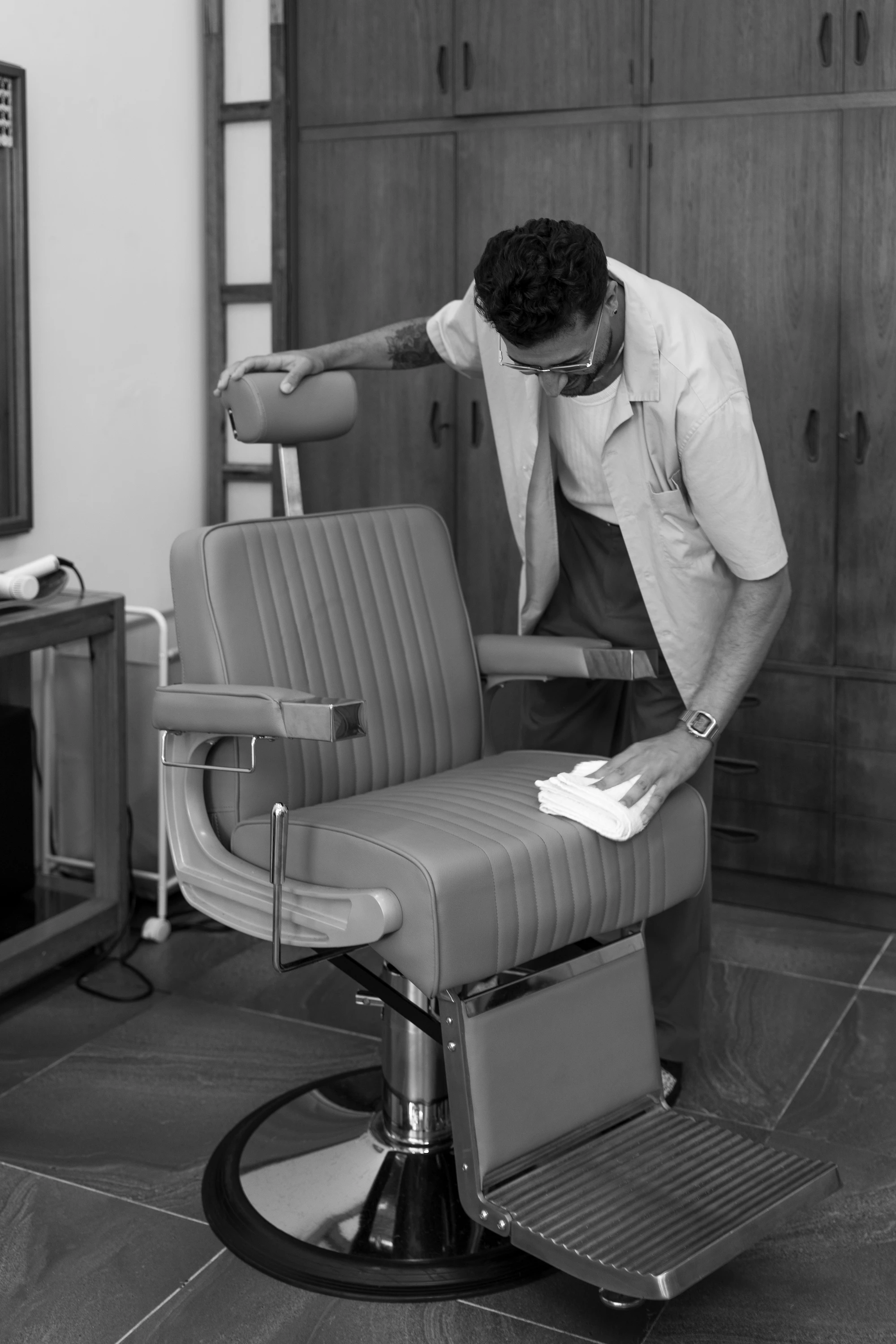 Barber cutting client's hair